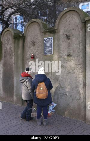 Cracow. Krakow. Poland. Former Cracow`s ghetto in Podgorze district. The last remaining section of the original ghetto wall at Lwowska Street. Stock Photo